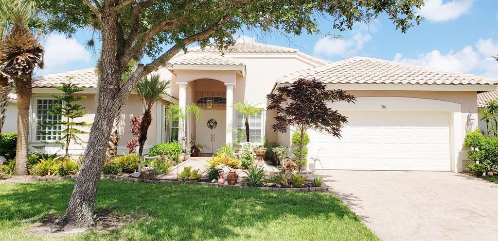 Photo of 386 NW Shoreview Drive, Saint Lucie West, FL 34986 (MLS # R10819868)