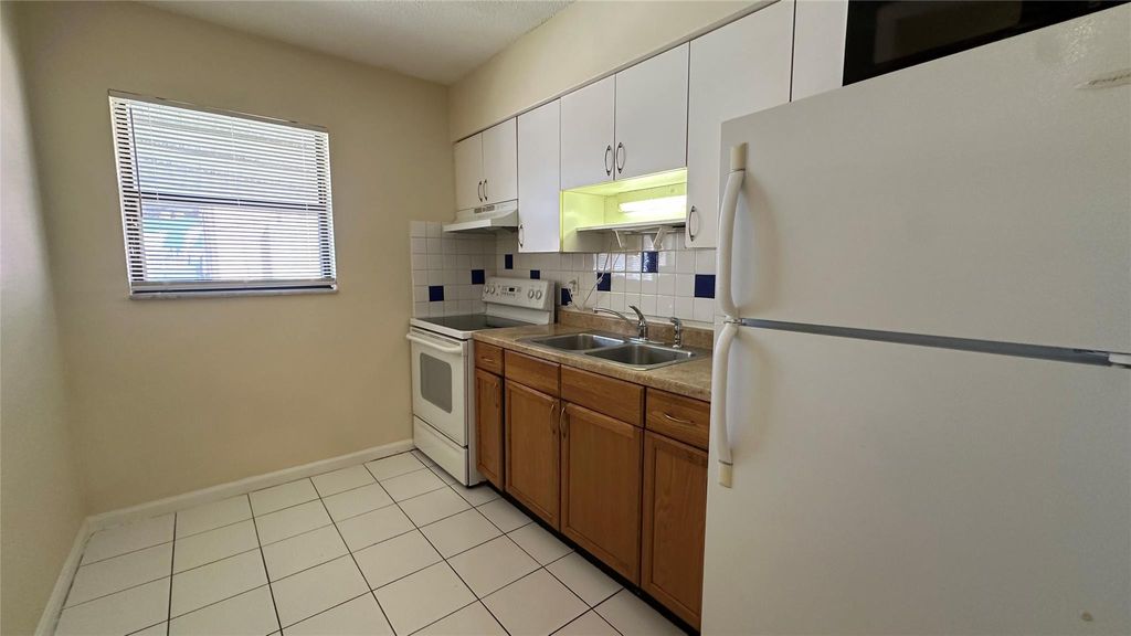 Photo of 1973 NE 4th Street #3, Deerfield Beach, FL 33441 (MLS # F10493918)