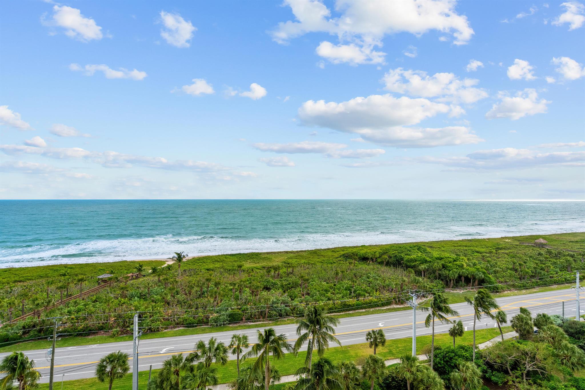 Beautiful 2 bed, 2 bath 11th floor unit with stunning ocean views! Unit features an airy floor plan with spacious rooms and large balcony! Garage parking & storage incl. Great amenities include community pool, club room, fitness rooms, billiards, tennis, and pickleball. Deeded beach access. Community fishing dock and kayak launch. Sizes approx/subj to error.