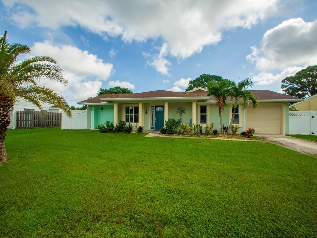 Photo of 1157 SE Maxwell Lane, Port Saint Lucie, FL 34952 (MLS # R10742412)