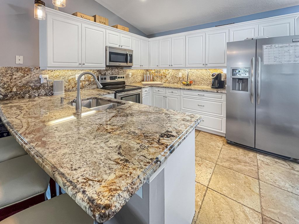 Photo of 2565 SW Riviera Road, Stuart, FL 34997 (MLS # B26022216)