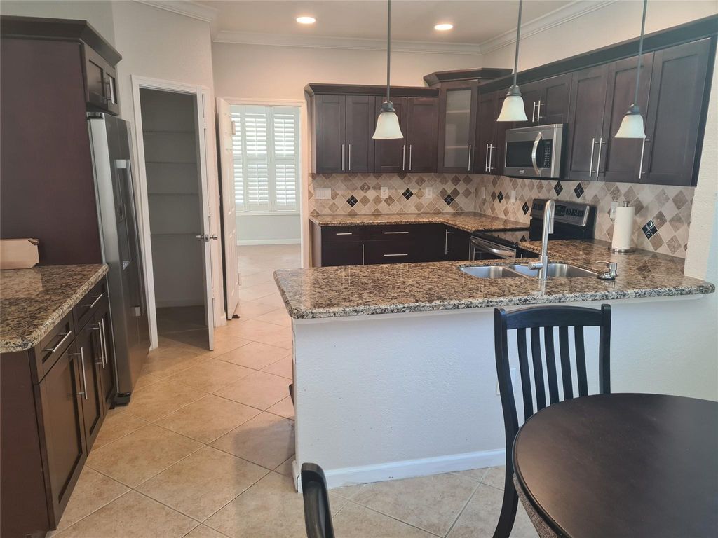 Photo of 1445 E Bexley Park Drive, Delray Beach, FL 33445 (MLS # F10465259)