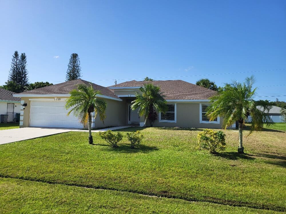 Photo of 231 SW Duval Avenue Ave, Port Saint Lucie, FL 34983 (MLS # R10818459)