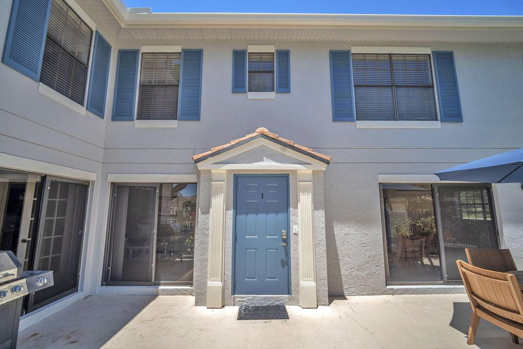 Photo of 390 Prestwick Circle #1, Palm Beach Gardens, FL 33418 (MLS # R10990597)