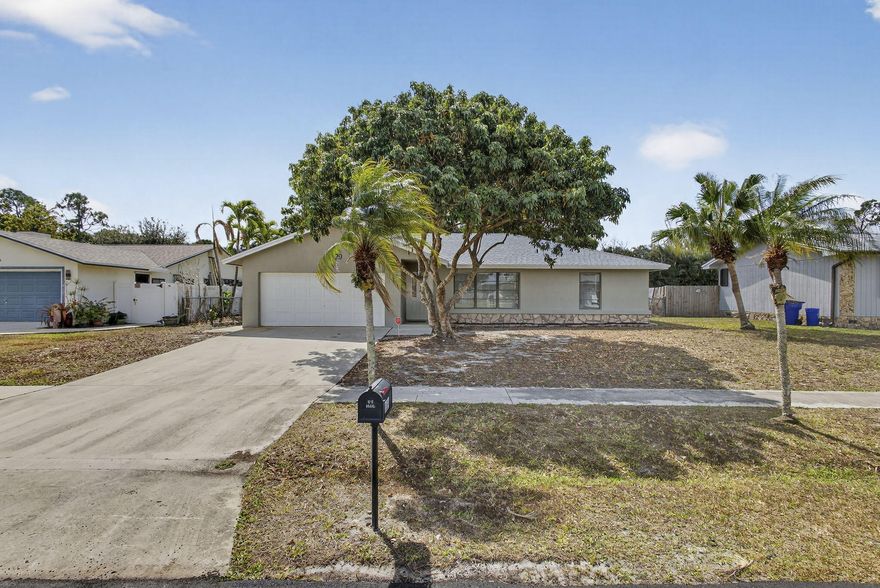 Fully updated 3 bedroom 2 bath home with a 2 car garage. Features new vinyl flooring throughout and a brand new roof and AC in 2025. The kitchen and bathrooms have been beautifully updated, and the home includes new stainless steel appliances. Additional upgrades include a new water heater and washer and dryer hookups. Spacious layout with modern finishes, offering a move in ready opportunity with major systems already updated.