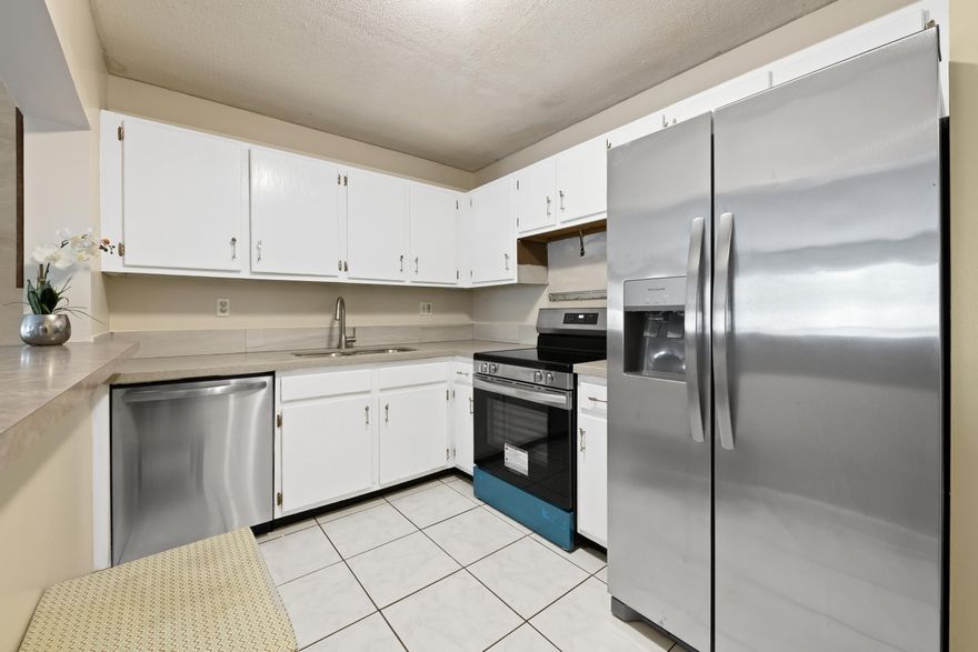 Spacious 2-bedroom, 2-bathroom condo located in the desirable all-ages community of Ramblewood. This well-maintained unit features tile flooring throughout, generously sized bedrooms, and updated bathrooms. The kitchen is equipped with stainless steel appliances, and a washer and dryer are conveniently located inside the unit.  Residents enjoy a variety of amenities with low HOA fees, including multiple pools, tennis courts, a clubhouse, fitness center, laundry facilities, and ample parking. Ideally situated near top-rated schools, shopping, dining, and entertainment options. Water is included in the maintenance fee.