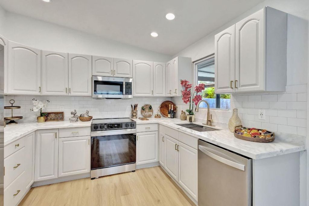 Photo of 9312 Pinion Drive, Lake Worth, FL 33467 (MLS # R11157756)