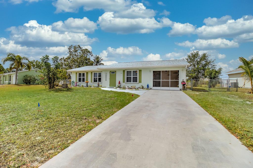 Photo of 702 SW Bridgeport Drive, Port Saint Lucie, FL 34953 (MLS # R10985816)