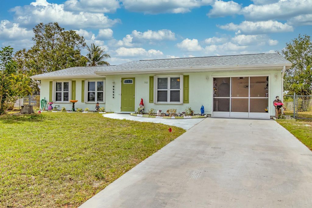 Photo of 702 SW Bridgeport Drive, Port Saint Lucie, FL 34953 (MLS # R10985816)