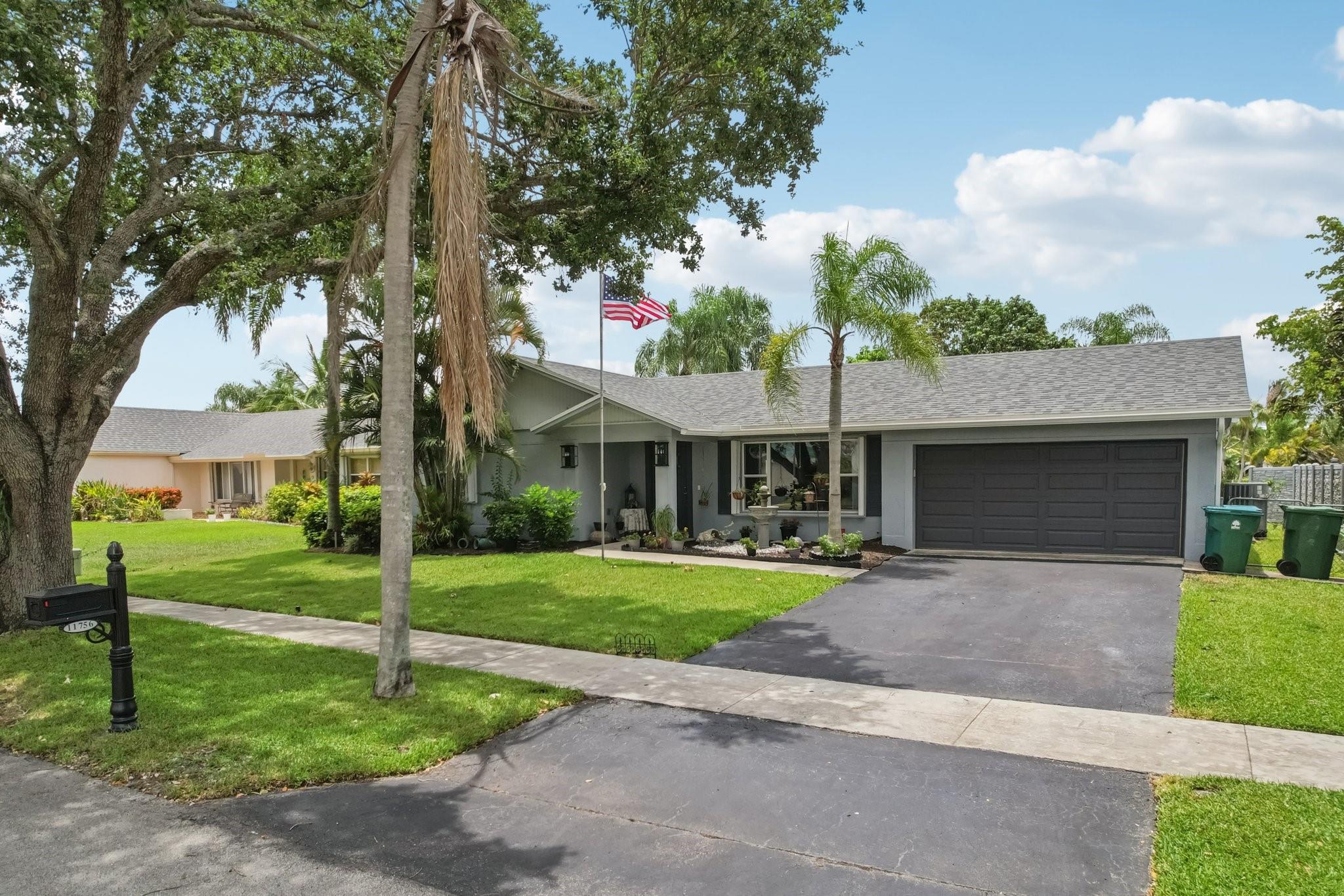 RARE chance to live lakeside in the highly desirable Flamingo Gardens community. Beautifully updated 4-bedroom, 2-bath lakefront pool home. Set in a family-friendly neighborhood, located within an A-rated school district, this home offers the ideal blend of comfort and peace of mind. Recent upgrades include a BRAND NEW roof with hurricane straps and water barriers, impact-rated garage door, central AC, and three new custom impact sliding glass doors leading to the large patio. Inside, enjoy a renovated kitchen with new appliances, updated bathrooms, and modern flooring. Step outside to a spacious screened-in patio, private lakeside pool, and new dock, perfect for relaxing or entertaining. A true gem in one of the area's most sought after neighborhoods.