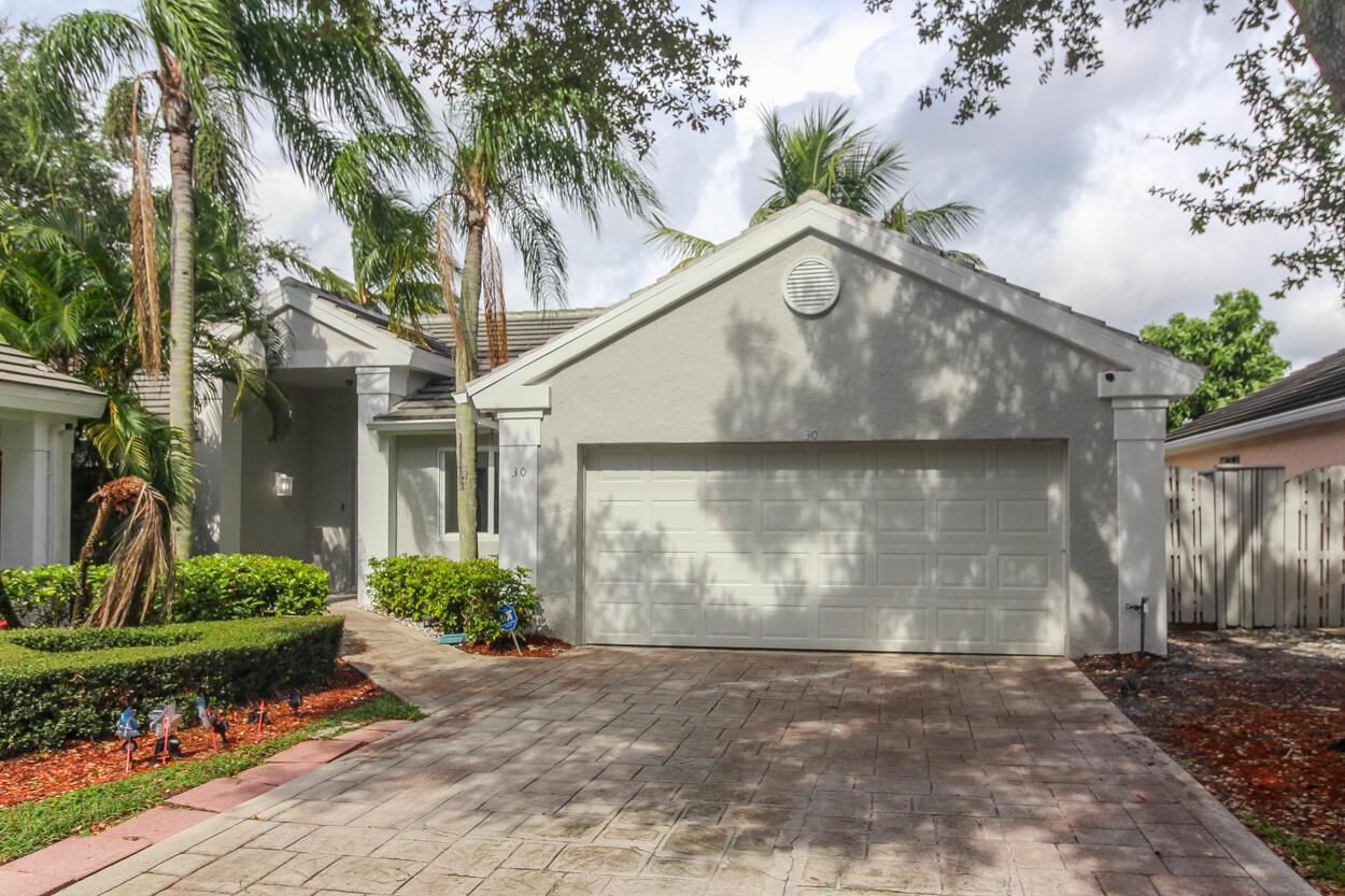 Completely Remodeled! Discover luxury living in the heart of Palm Beach Gardens with this stunning three-bedroom, two-bathroom home located in the prestigious Bristol community within PGA National. This beautifully appointed residence combines elegance and modern comfort, offering a lifestyle of convenience and sophistication. The property features 3 spacious bedrooms and two full baths. Enjoy your screened-in porch with Florida's beautiful sunshine, perfect for relaxing or entertaining. The 2+ car garage provides ample storage space and convenience. And then there's the Kitchen! A beautiful, modern kitchen equipped with new appliances, ample counter space, and stylish cabinetry. The master suite is a true retreat with a spacious layout, walk-in closet, and a luxurious en-suite bathroom
