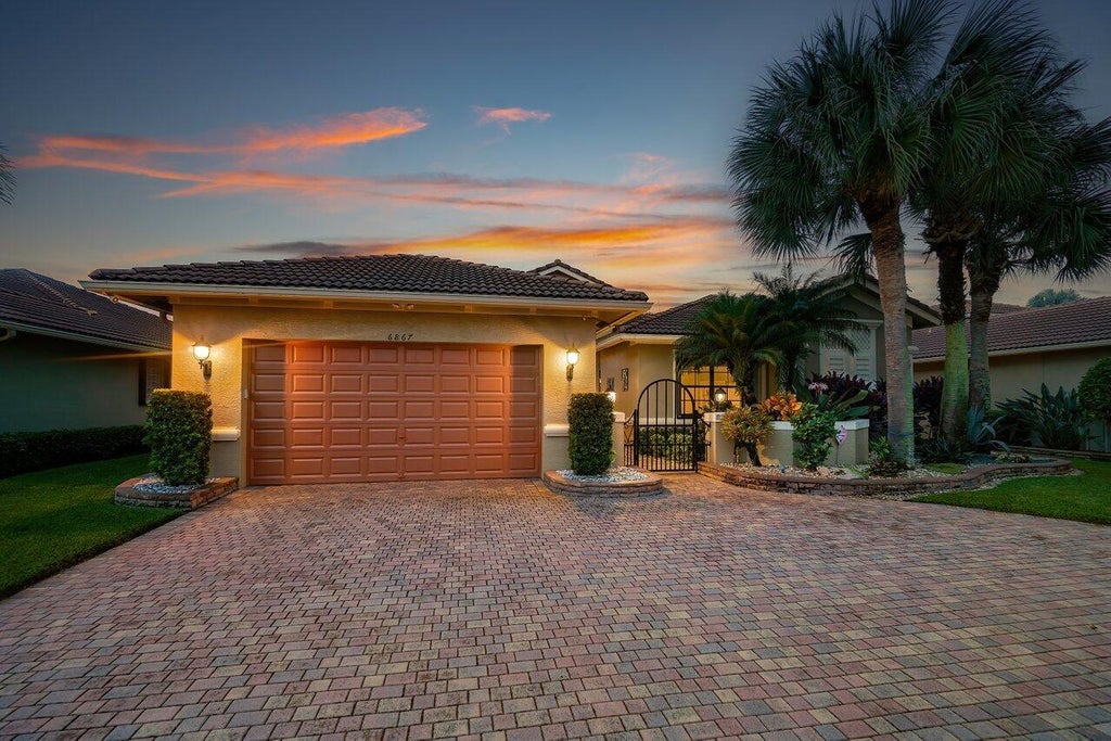 Photo of 6867 Caviro Lane, Boynton Beach, FL 33437 (MLS # R10923810)