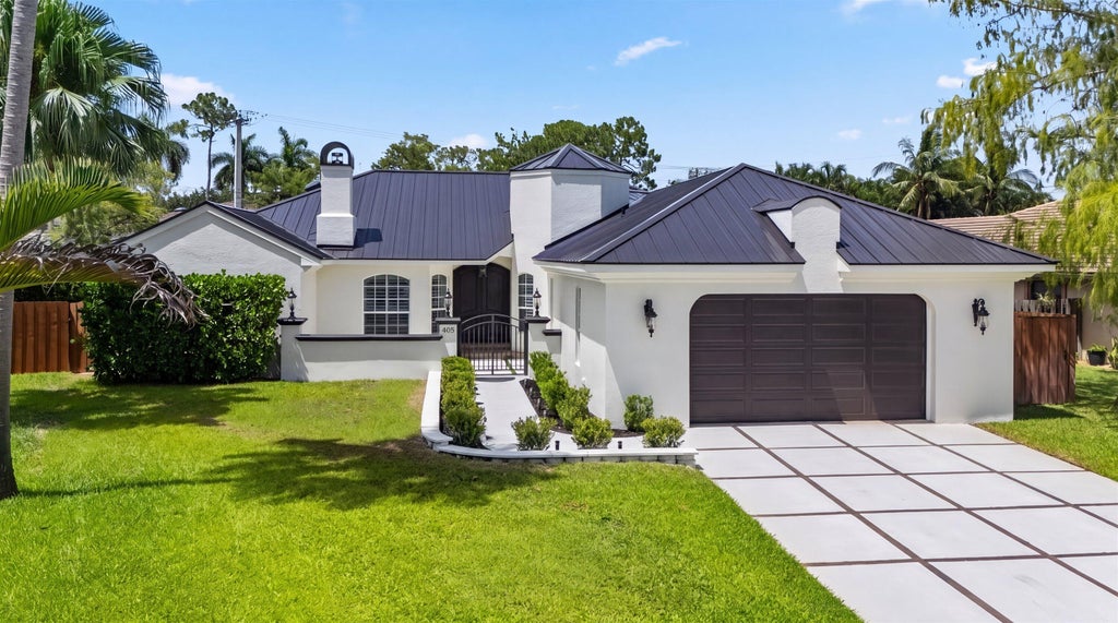 Photo of 404 INDIGO Avenue, Wellington, FL 33414 (MLS # B26054915)