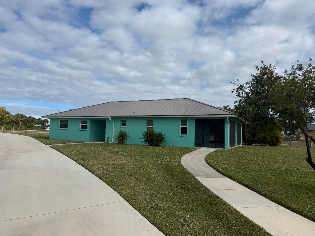 Photo of 11816 SW Grapefruit Court, Palm City, FL 34990 (MLS # R11148999)