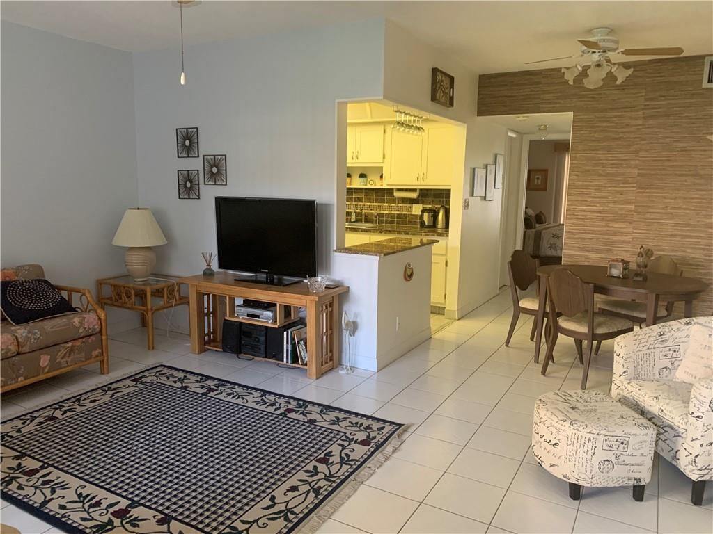 Photo of 3071 NW 47th Ter #128, Lauderdale Lakes, FL 33313 (MLS # F10314343)