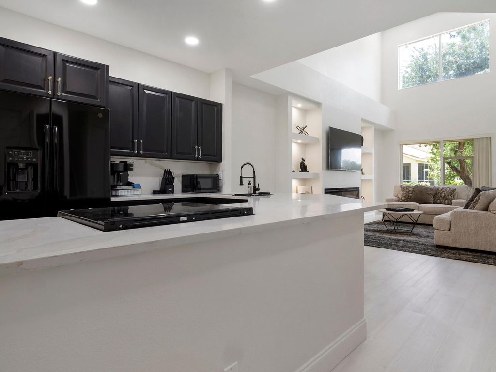 Photo of 9011 Sand Shot Way, Port Saint Lucie, FL 34986 (MLS # B26000259)