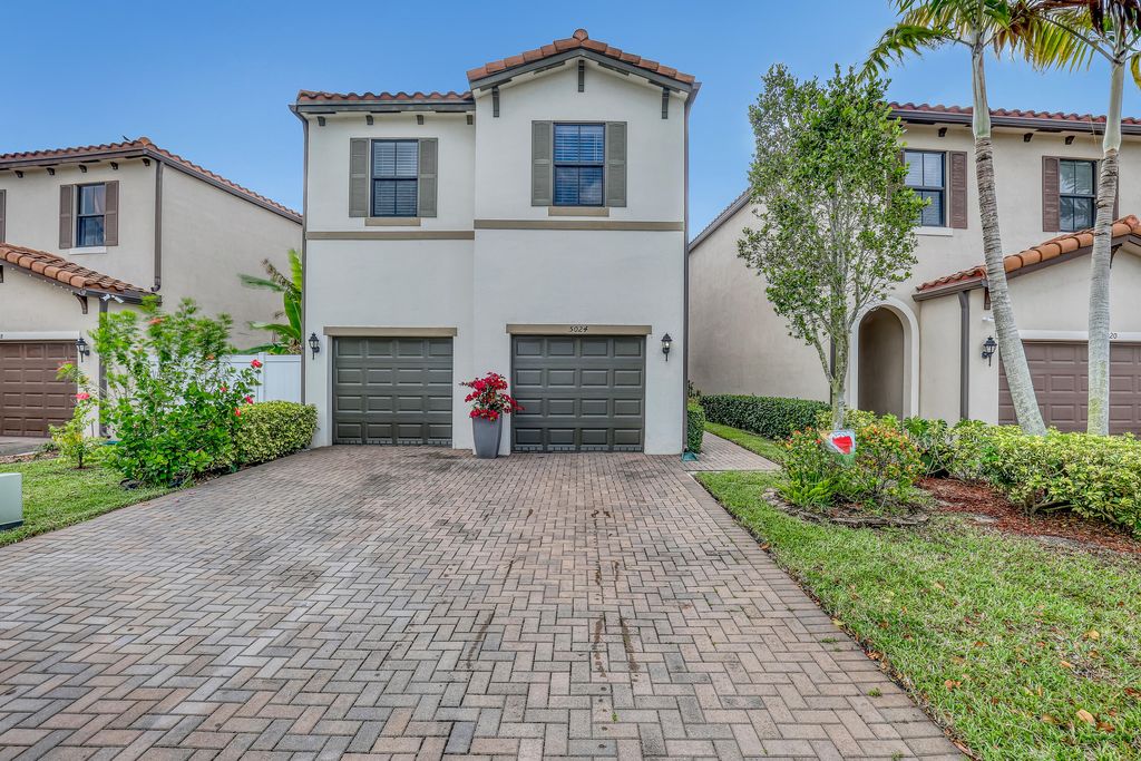 Photo of 5024 Laurel Oak Drive, Riviera Beach, FL 33410 (MLS # B26014621)