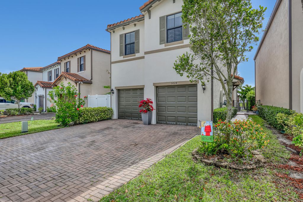 Photo of 5024 Laurel Oak Drive, Riviera Beach, FL 33410 (MLS # B26014621)
