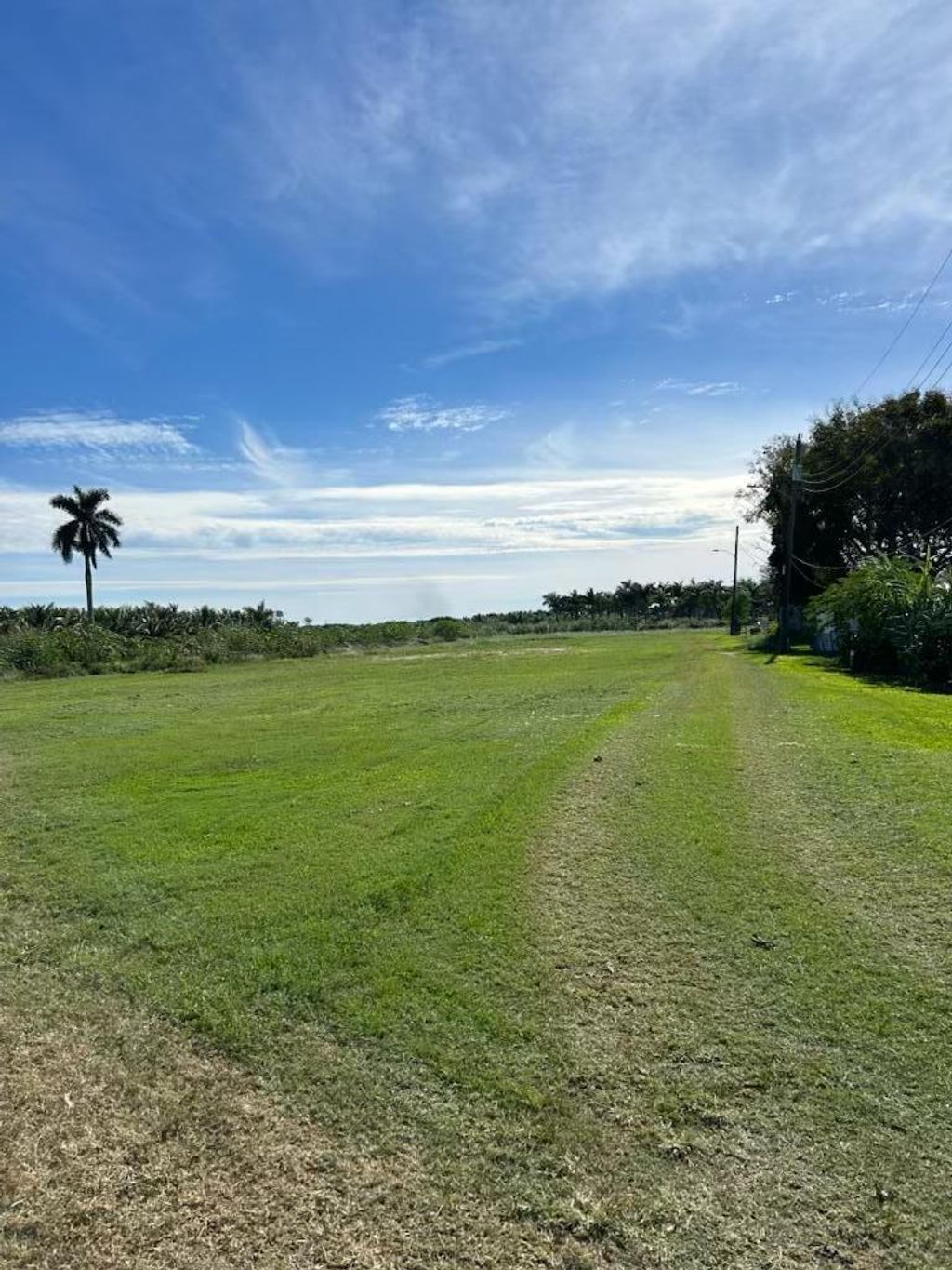 Photo of 800 Barack Obama Boulevard, Pahokee, FL 33476 (MLS # R10943769)