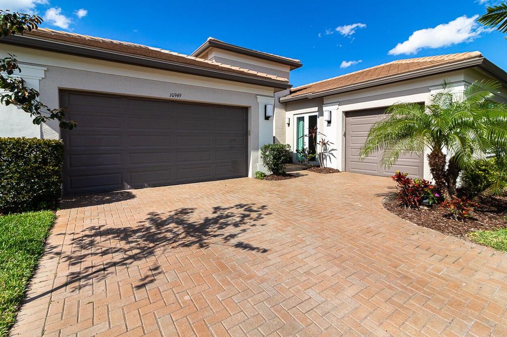 Photo of 10949 SW Ivory Springs Lane, Port Saint Lucie, FL 34987 (MLS # R10972171)