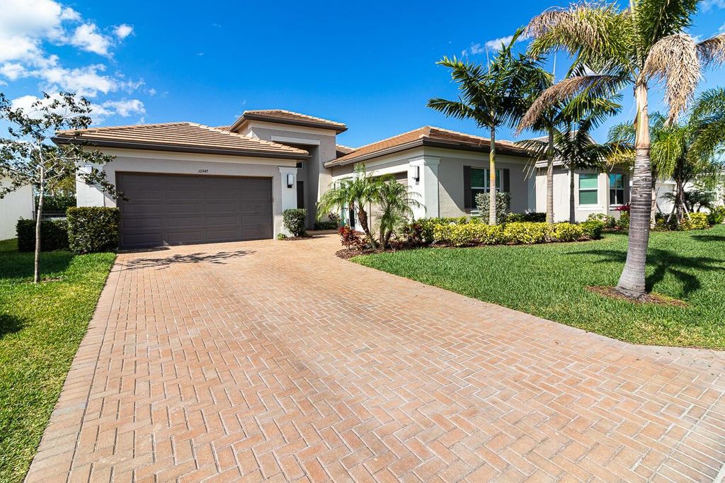 Photo of 10949 SW Ivory Springs Lane, Port Saint Lucie, FL 34987 (MLS # R10972171)