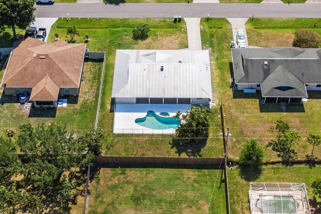 Photo of 1457 SE Barker Lane, Port Saint Lucie, FL 34983 (MLS # R10986040)