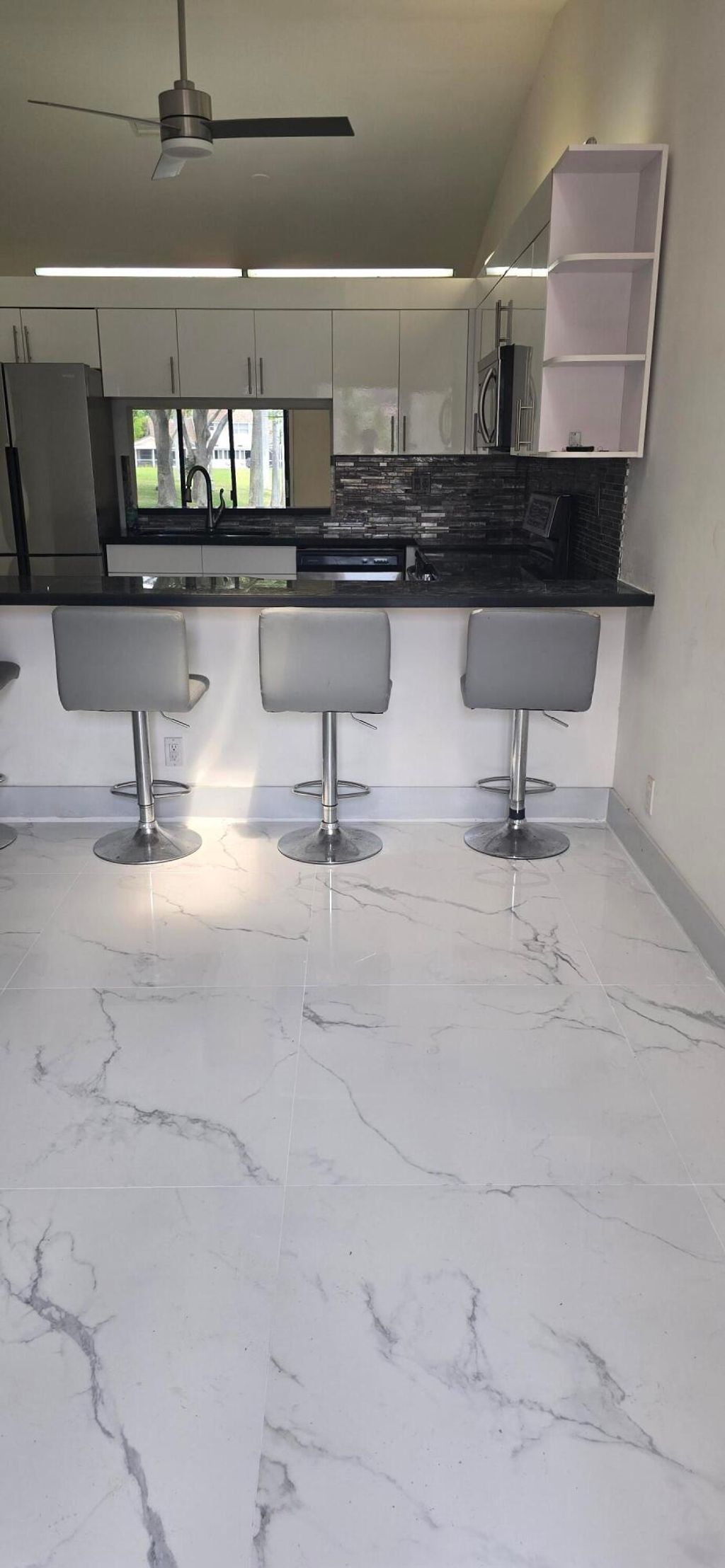 Photo of 5161 NW 11th Lane, Pompano Beach, FL 33064 (MLS # B26017928)