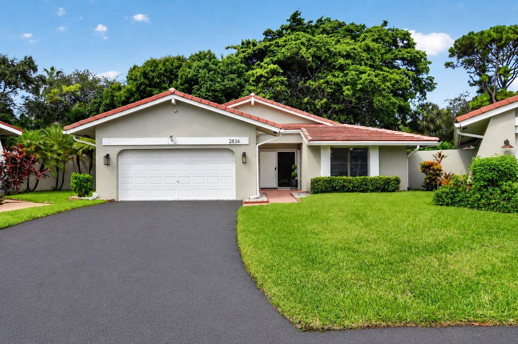 Photo of 2834 DEER CREEK KELLY BROOKE Lane, Deerfield Beach, FL 33442 (MLS # B26073517)