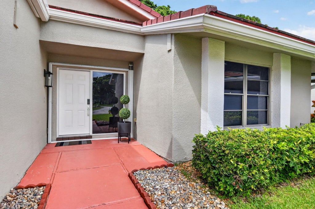 Photo of 2834 DEER CREEK KELLY BROOKE Lane, Deerfield Beach, FL 33442 (MLS # B26073517)
