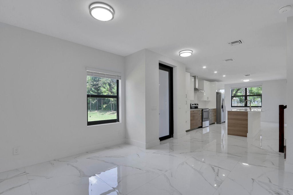 Photo of 406 Bella Sol Way, West Palm Beach, FL 33406 (MLS # B26043057)