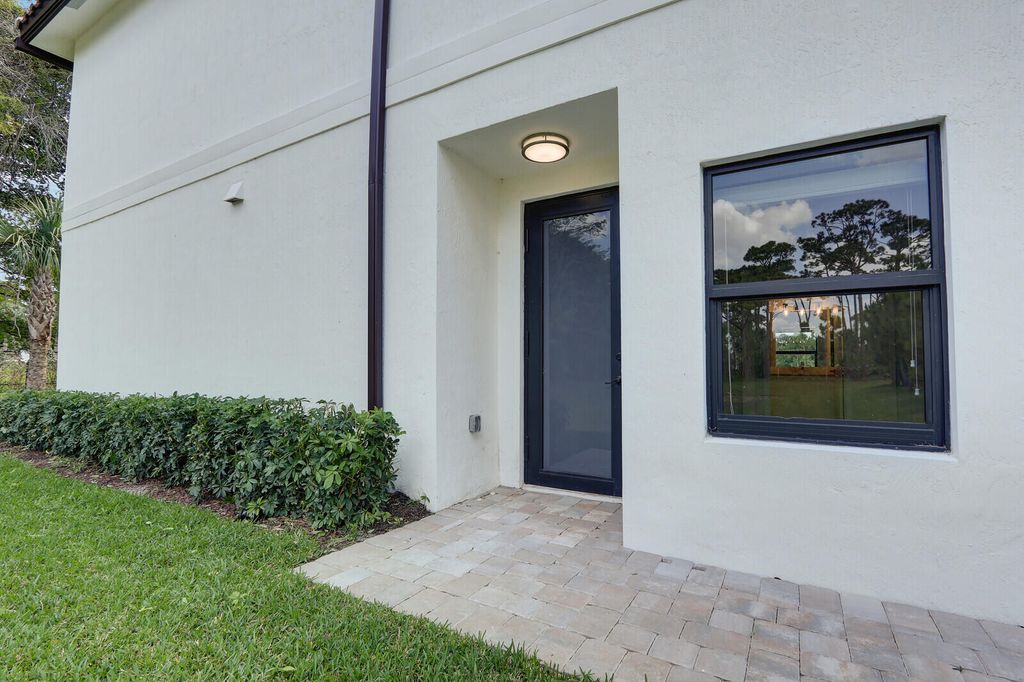 Photo of 406 Bella Sol Way, West Palm Beach, FL 33406 (MLS # B26043057)