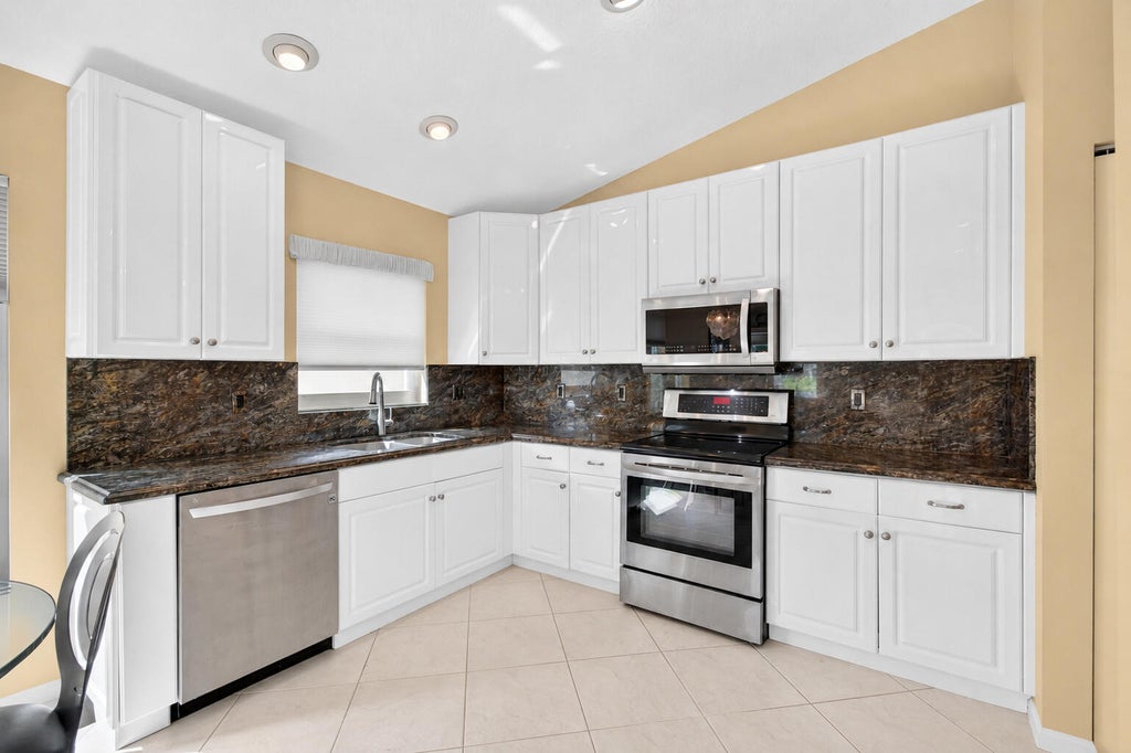Photo of 6549 Sun River Road, Boynton Beach, FL 33437 (MLS # B26088567)