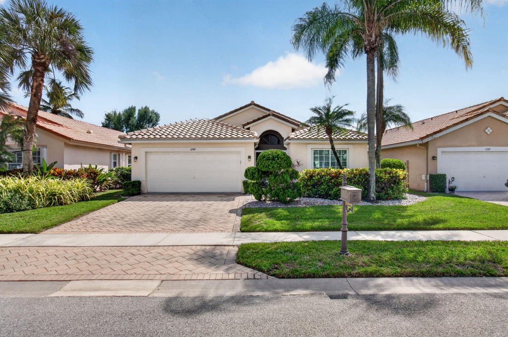 Photo of 6549 Sun River Road, Boynton Beach, FL 33437 (MLS # B26088567)