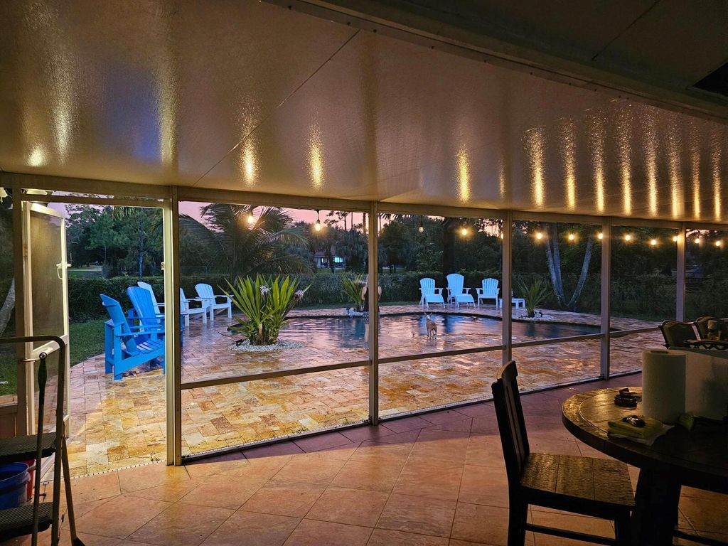 Photo of 6888 150th Place N, Palm Beach Gardens, FL 33418 (MLS # R11028234)