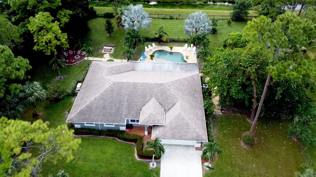 Photo of 6888 150th Place N, Palm Beach Gardens, FL 33418 (MLS # R11028234)