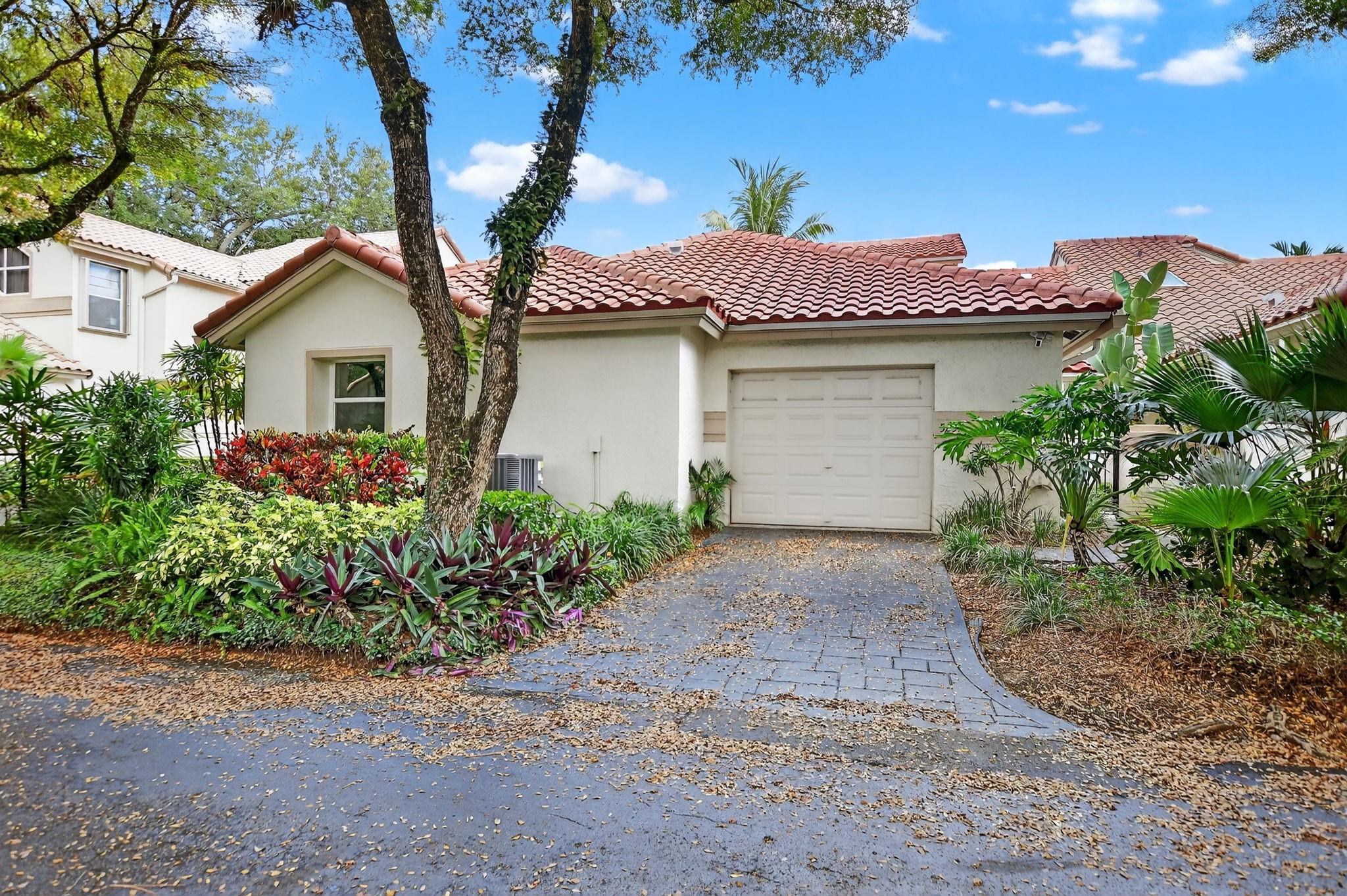 Wow! Hurry this one will not last! Gorgeous Updated Villa in the heart of Boca Raton. Just Minutes from the Town Center Mall. Open floor plan, light and bright. Kitchen with Granite & Stainless Steel appliances. Breakfast area and snack bar. Souring vaulted ceilings give it an open and spacious feel!. TWO Primary Suites! Walk in closets. Private screened in Patio and pavered yard for your enjoyment. Large one car garage with washer and dryer. Short walk to Community Pool, Hot tub and Clubhouse. A must see! Pets allowed, 25lbs or less. Close to shopping, dining, places of worship. Not far from I95, and the most beautiful beaches!