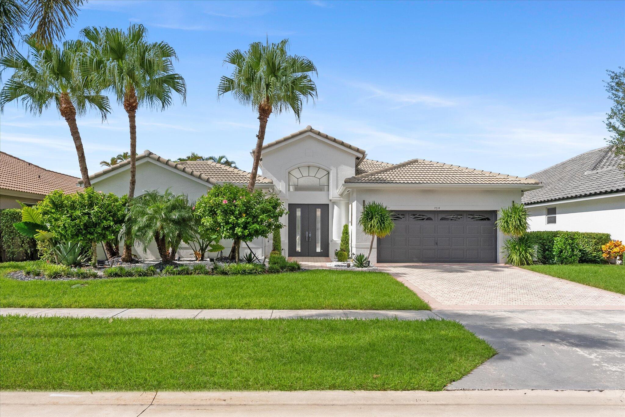 Step into modern elegance in this beautifully updated courtyard home in the sought-after La Corniche community at Boca Pointe. Featuring 3 bedrooms and 3.5 baths, including a private guest house, this residence offers spacious open living with large modern tile flooring and designer light fixtures throughout. The stunning kitchen has been completely redesigned with quartz counters, full backsplash, a massive island, and slate-colored appliances. The primary suite includes two custom walk-in closets and a spa-like bath. Outside, enjoy a refinished pool with a beautiful new stone deck--perfect for relaxing or entertaining. Recent updates include two new A/C units (2023) and two new water heaters. Enjoy the best of Boca living with a newer roof (2018/2019) and optional club membership.
