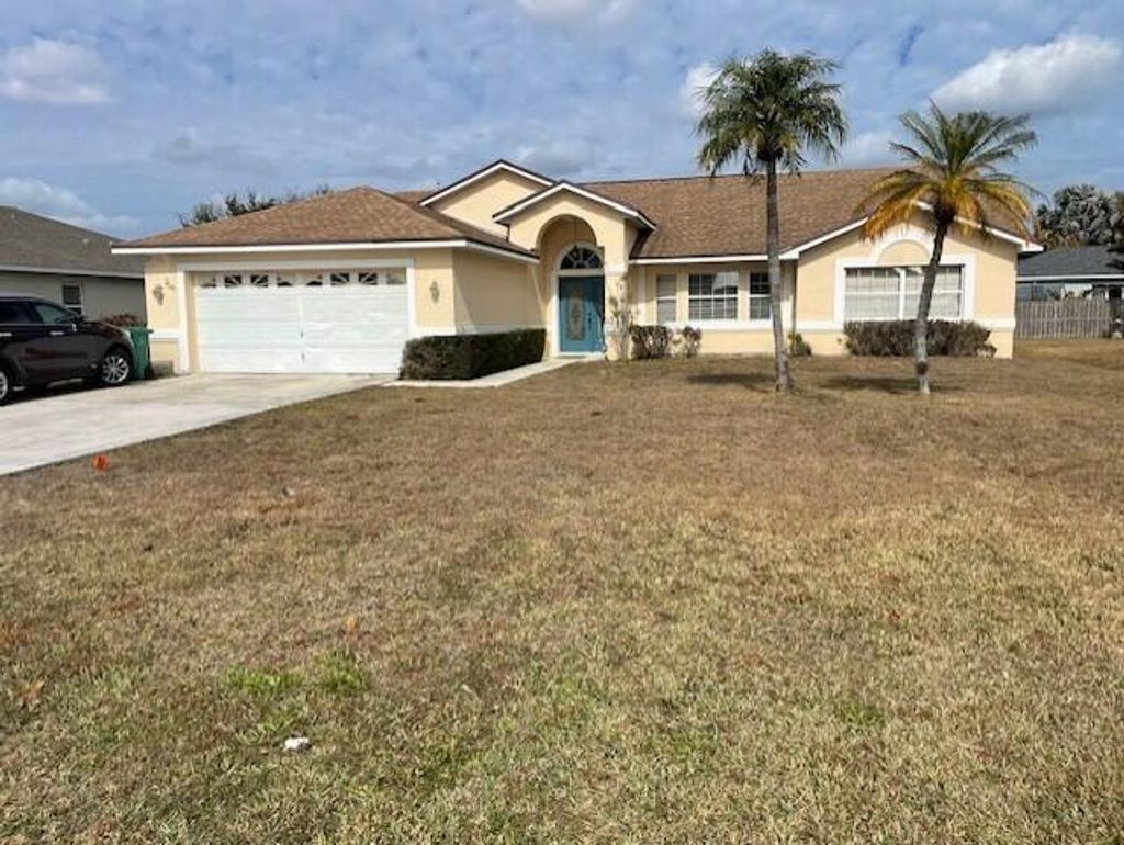 Photo of 2341 SE Melaleuca Boulevard E, Port Saint Lucie, FL 34952 (MLS # R11162388)