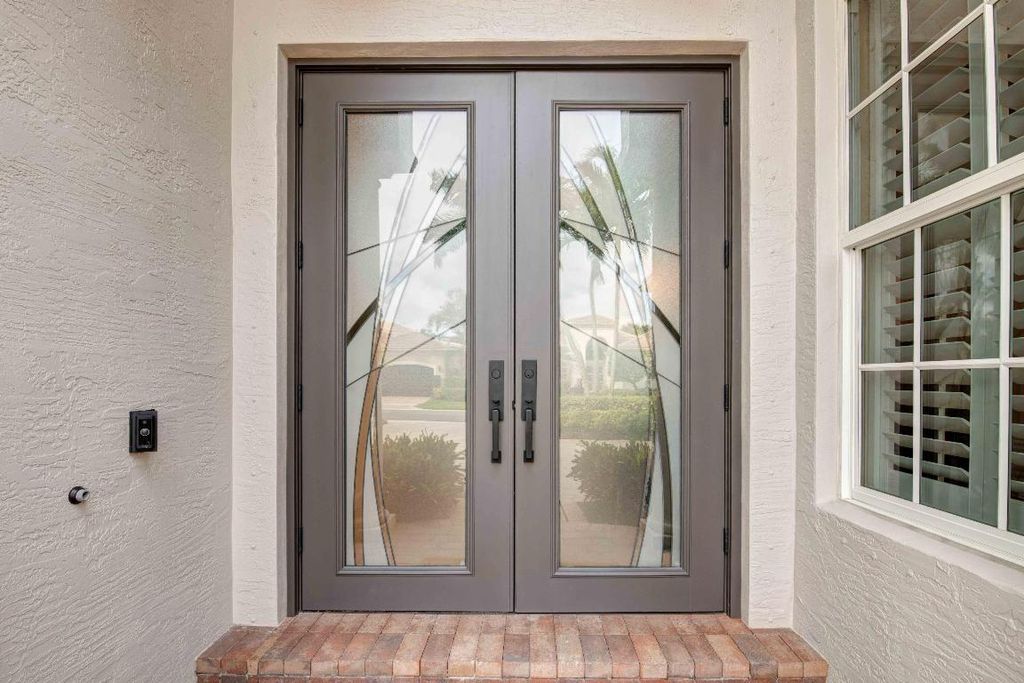 Photo of 319 Vizcaya Drive, Palm Beach Gardens, FL 33418 (MLS # R10976312)