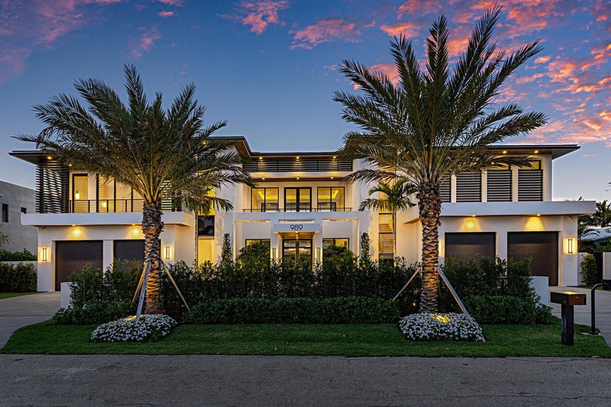 Welcome to The Marble Palm Estate, a British West Indies-inspired masterpiece, just steps from the beach. Nestled on 119 feet of deep-water frontage, this newly constructed estate offers 5 bedrooms, 5.2 baths, and an exquisite blend of sophisticated design and cutting-edge technology.Upon entry, you are greeted by a lovely living room featuring stunning Azure Blue Quartzite slabs around the gas fireplace and TV, adding a touch of natural beauty and elegance to the space. The open concept seamlessly flows into the gourmet chef's kitchen, which is framed by a beautiful Cypress wood ceiling, creating a warm and inviting atmosphere. The kitchen features bar seating for 5/6, offering an ideal spot for casual dining or entertaining. Outfitted with top-tier Wolf & Sub-Zero appliances, it is