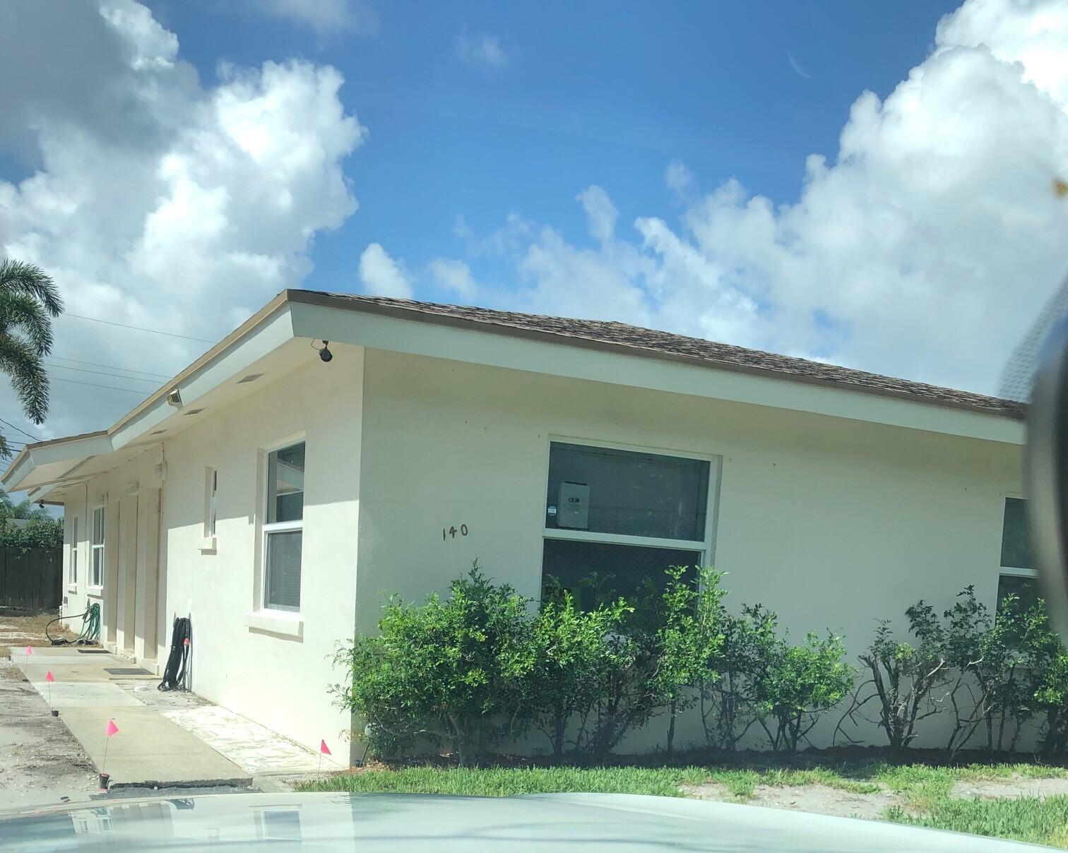 Front unit of duplex. Carpeted living and bedrooms. New kitchen. Impact windows. Ceiling fans. Central a/c. Partially fenced yard. Close to beach, shopping, south of Boynton City Hall.