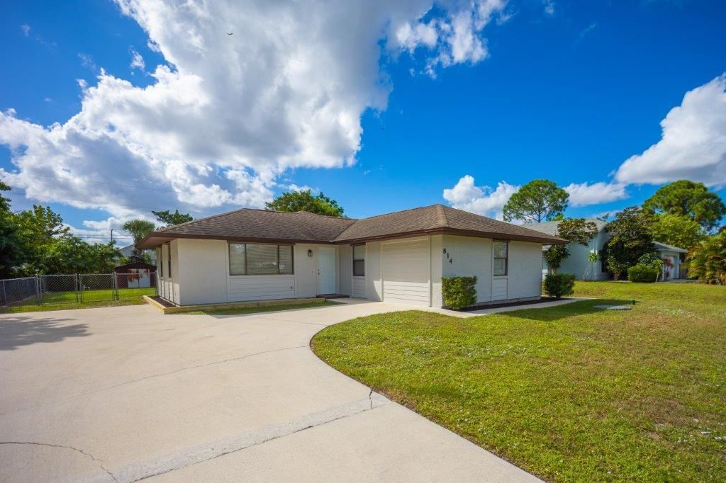 Photo of 814 SW Del Rio Boulevard, Port Saint Lucie, FL 34953 (MLS # R10755139)