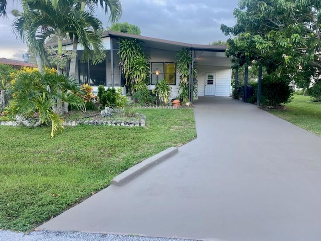 Photo of 2844 SW Thunderbird Trail, Stuart, FL 34997 (MLS # R10839309)