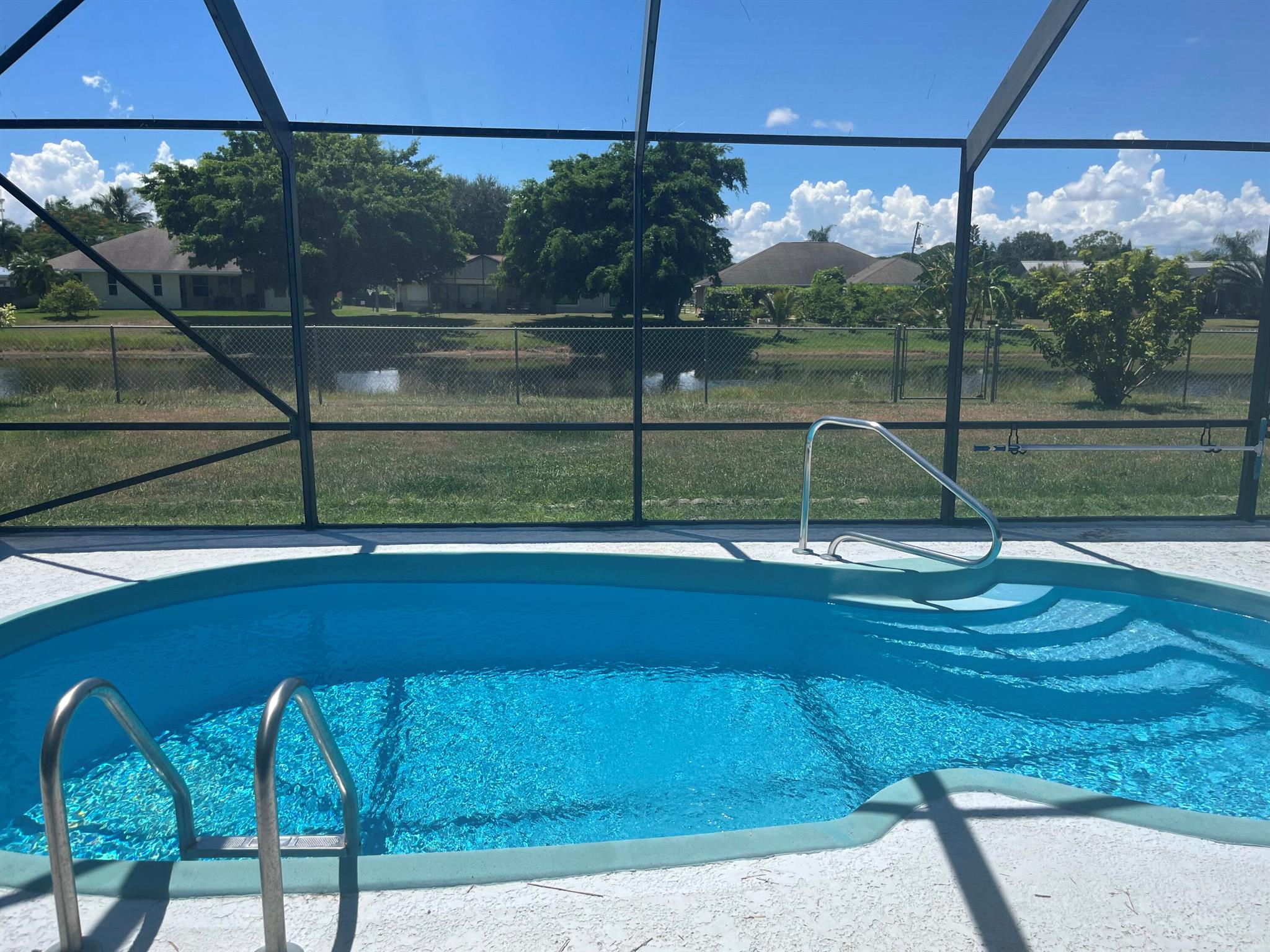 Beautiful Pool home with a large fenced back yard that backs up to a gorgeous canal. 3 bedrooms, 2 bathrooms, and pool care is included. Professional pictures coming Friday! Schedule your showing now!!!