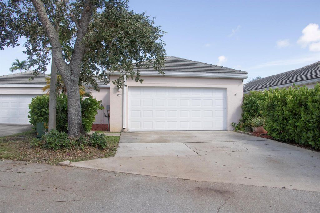 Photo of 1037 Island Manor Drive, Greenacres, FL 33413 (MLS # R11126751)