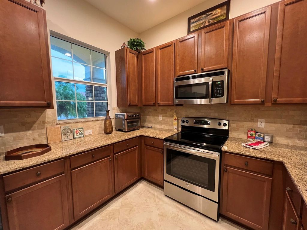 Photo of 10263 SW Reggiani Road SW, Port Saint Lucie, FL 34987 (MLS # R10987058)