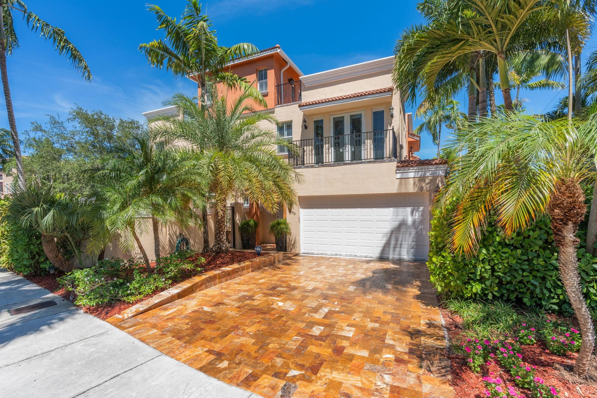 Experience Timeless Sophistication in This Beautifully Maintained 3 Story Corner Residence Featuring Two Side Yards & Two Sunroofs! Minutes to the Beach, Great Shopping and the Best Fine Dining That Fort Lauderdale Has to Offer. A 3-Bedroom Plus Loft/4th Bedroom, 3.5 Bath Home with an Elegant Open Layout Superb for Both Every Day Comfort and High End Entertaining. Soaring Ceilings, and Tasteful Finishes Establish a Warm and Inviting Ambience. The Gourmet Kitchen Compliments Spacious Living and Dining Areas. Generously Sized Bedrooms. Relax or Entertain Poolside in Your Private 'Florida Lifestyle' Haven. 2 Car Garage, Impact Windows, Prime Location, and Top Rated Schools Make This a Golden Opportunity!
