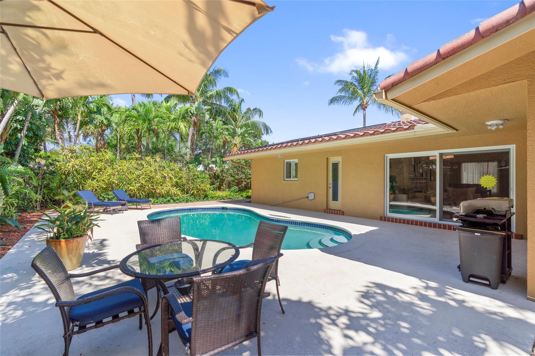 Lovely 3 bedroom house in the safe and quiet location of Fort Lauderdale, just 2 miles to the beach. FULLY FURNISHED and equipped home with fully equipped kitchen. You can enjoy an outdoor dining patio and grilling with lounge chairs by the HEATED POOL with 100% privacy. Large open space living room with fireplace / bar / coffee table area and dining table area with a delicate tropical garden and pool view. Master bedroom with king-size bed, walk-in closet, en-suite full bathroom with the bath. Second bedroom with another king-size bed, closet and a shared full bathroom with the shower. Service room with washer, dryer and an office area. Listed rent is for 12 months lease. Seasonal rental available - prices depending on the duration. Possible to rent UNFURNISHED.