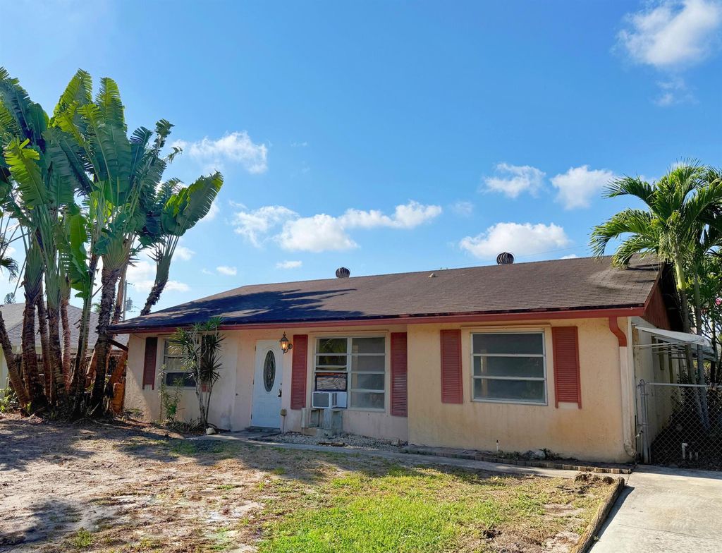 Photo of 3298 Parade Place, Lake Worth, FL 33462 (MLS # R11091454)