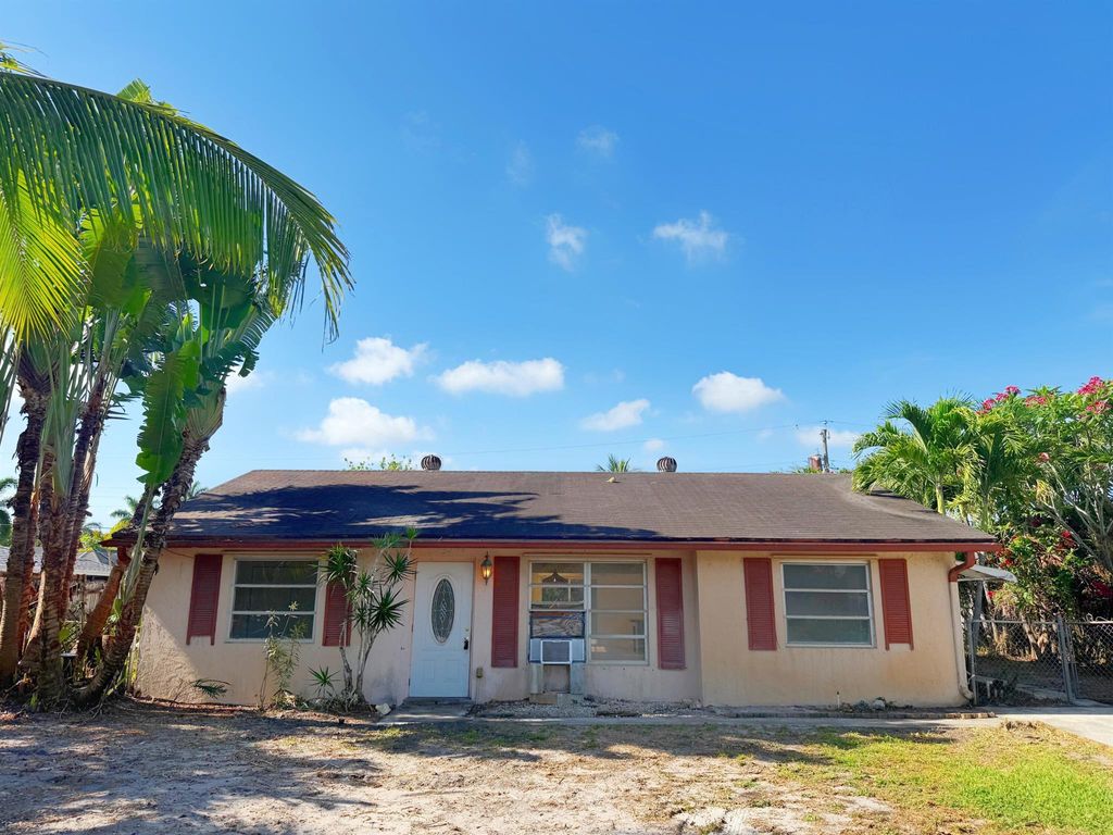 Photo of 3298 Parade Place, Lake Worth, FL 33462 (MLS # R11091454)